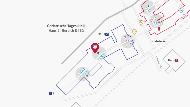 Karte eines Geländes mit markierten Gebäuden, Wegen und Eingängen sowie einem Standortpin für die Geriatrische Tagesklinik.